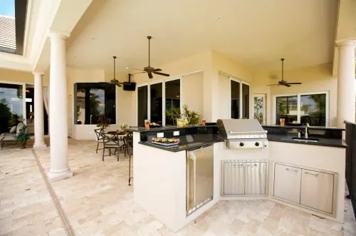 Covered outdoor kitchen in Ashland PA by KDI Hardscapes